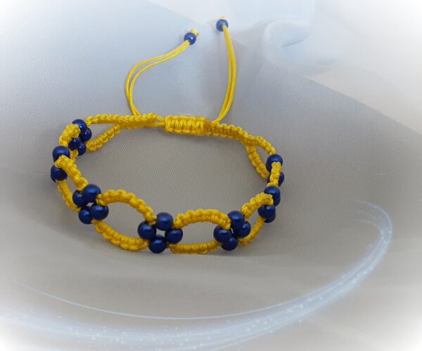 Pulsera trenzada tejido alondra. Amarilla.